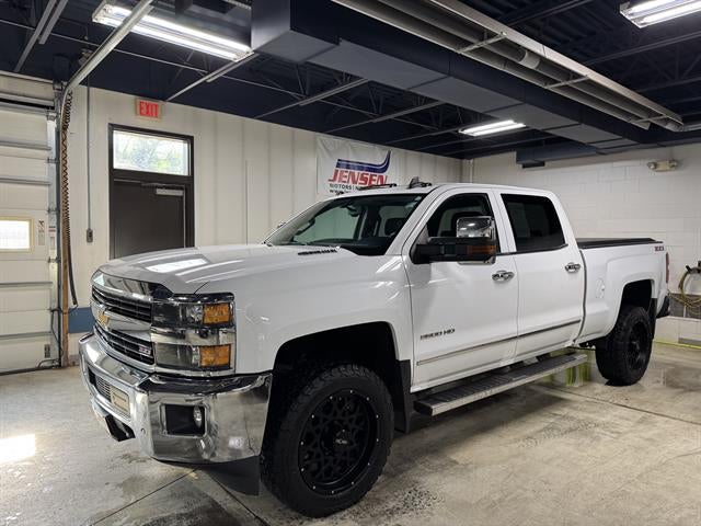 2015 Chevrolet Silverado 2500 HD LTZ in Summit White — front three-quarter view