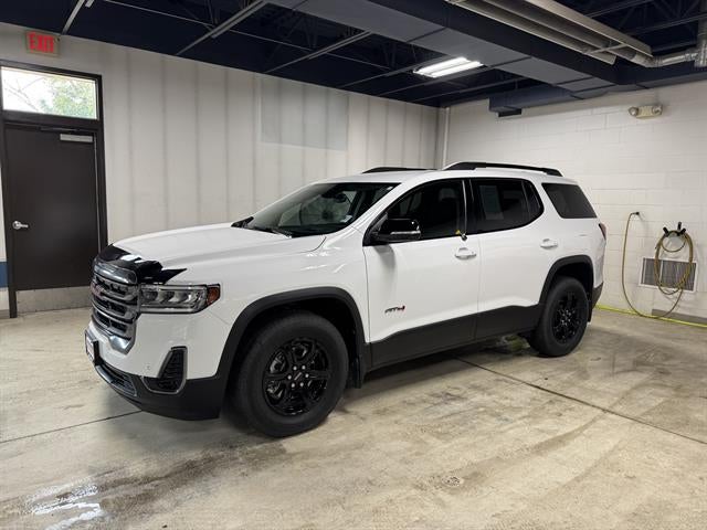 2023 GMC Acadia AT4 in Summit White — front three-quarter view