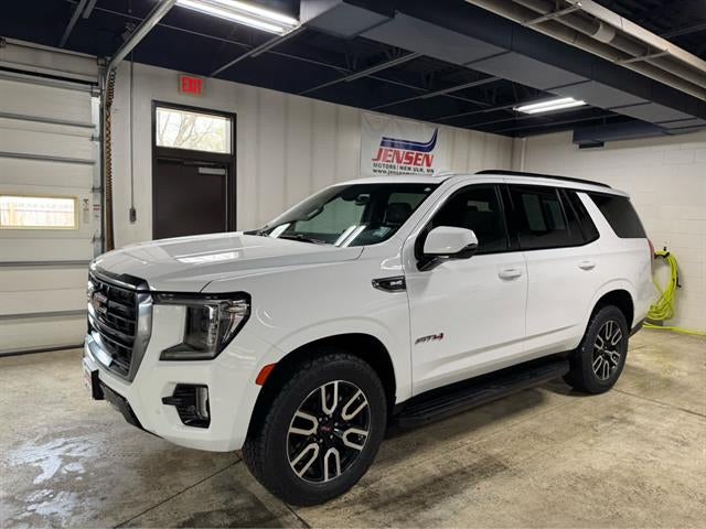2022 GMC Yukon AT4 in Summit White — front three-quarter view