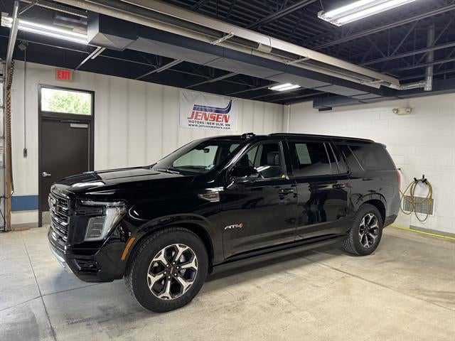 2025 GMC Yukon XL AT4 Ultimate in Onyx Black — front three-quarter view