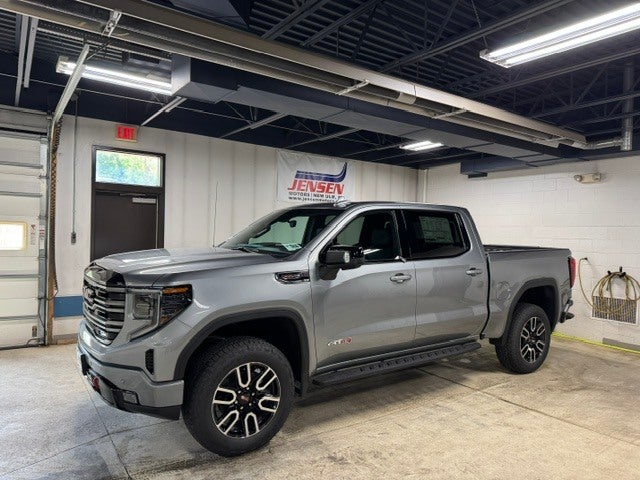 2026 GMC Sierra 1500 AT4 in Sterling Metallic — front three-quarter view