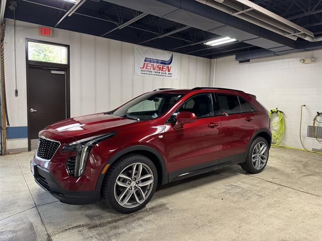 2019 Cadillac XT4 AWD Sport in Red Horizon Tintcoat — front three-quarter view