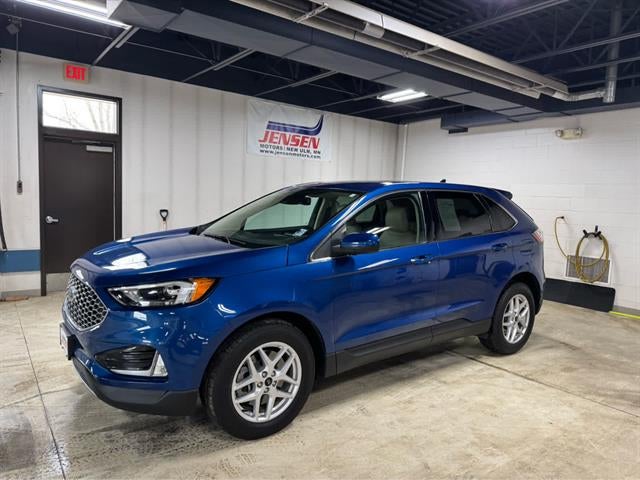 2024 Ford Edge SEL in Atlas Blue — front three-quarter view