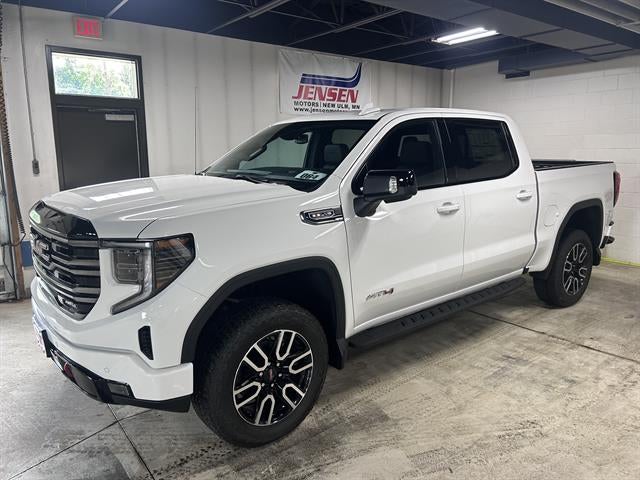 2026 GMC Sierra 1500 AT4 in Summit White — front three-quarter view