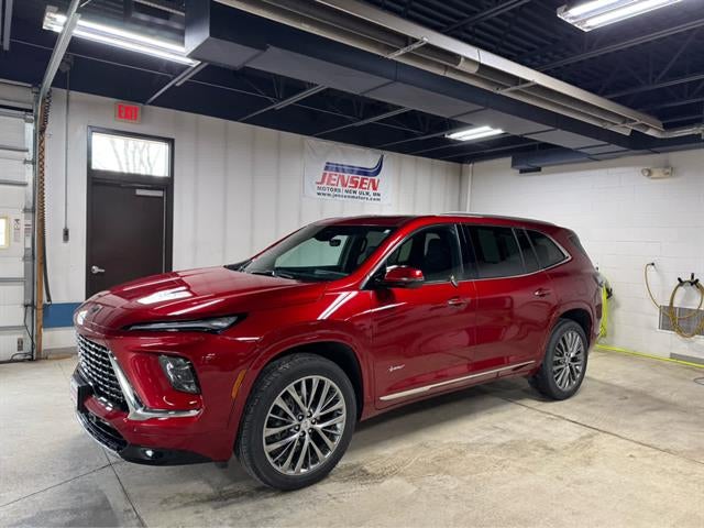 2025 Buick Enclave Avenir in Cherry Red Tintcoat — front three-quarter view